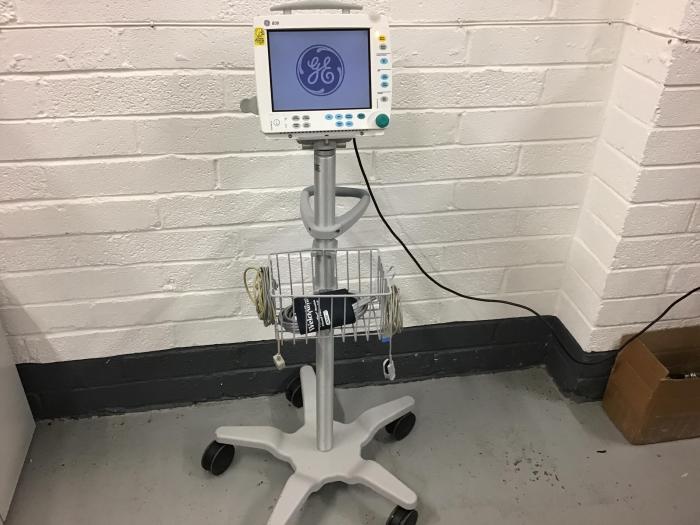 GE patient monitor on roll stand B30